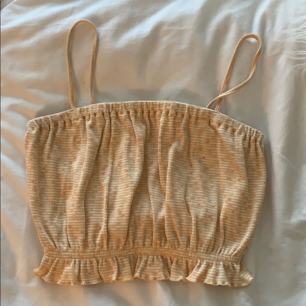 Pale yellow crop tank